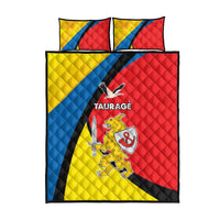 Taurage quilt bed set, red-yellow-blue quilt with black stripes, crest, and TAURAGE text