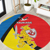 Round floor carpet with red, blue, and yellow Taurage crest graphic