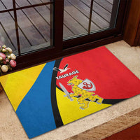 Red and yellow rubber doormat with Taurage crest and blue diagonal stripe