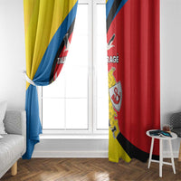 Hanging window curtain with yellow and red panels, blue diagonal stripe, crest print