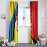 Pair of window curtains with yellow and red sections and blue diagonal stripe design