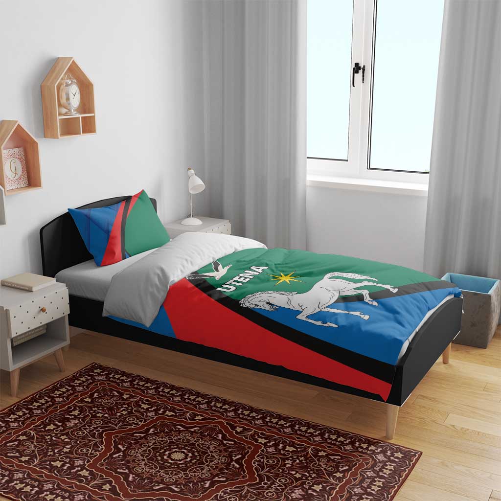 Bedding set on bed with blue, red and green duvet showing white horse and UTENA