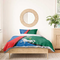 Blue, red and green bedding set with white horse and UTENA on duvet and pillow