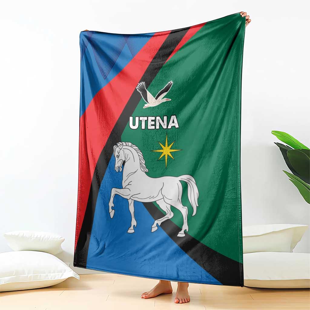 Flag-themed blanket in blue, green, and red with Utena text, horse, and eagle