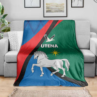 Flag-themed throw blanket with horse illustration and Utena lettering on blue, red, green