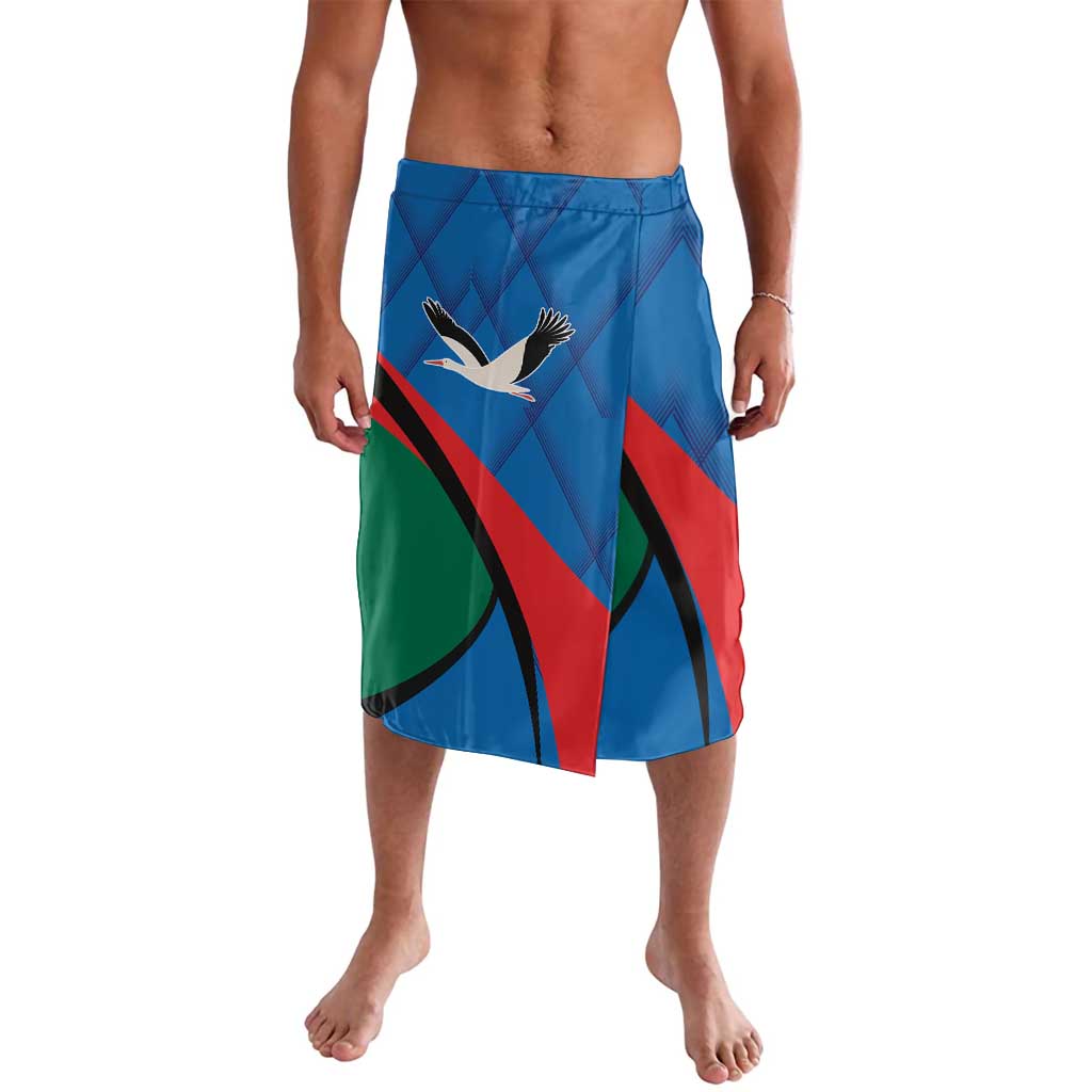 Blue printed shorts with bird graphic and diagonal green and red panel design