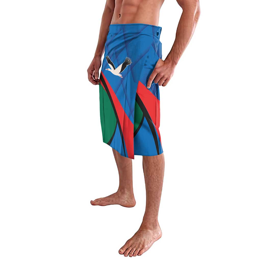 Blue printed board shorts with elastic waistband and bird emblem graphic