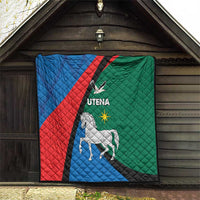 Quilt blanket in doorway niche, blue red green diagonal stripe with horse emblem and Utena