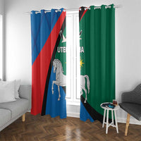 Utena-themed curtains with metal grommets across the top; blue and green with emblems