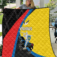 Vilnius flag quilt with black, red, yellow, and blue panels; quilted diamond pattern