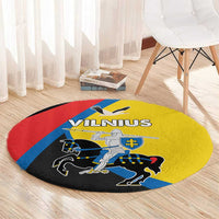 Round carpet with Vilnius graphic, yellow center with red, blue and black sections