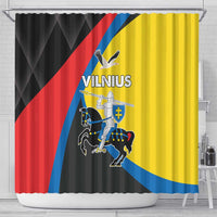 Black shower curtain featuring Vilnius crest graphic with red, blue, and yellow diagonal stripes