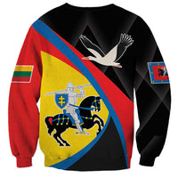 Black unisex sweatshirt, back view with eagle and shield print on diagonal flag stripes