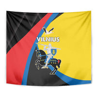Vilnius tapestry in yellow, red, blue, and black showing "VILNIUS" and a rider