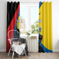 Window curtains with black and yellow Vilnius crest artwork and top hanging rings