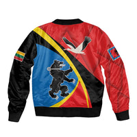 Unisex bomber jacket, red/blue/black back with large bird-and-lion crest graphic