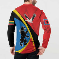 Red button sweatshirt on model, back graphic with diagonal blue panel and bird