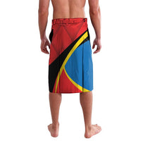 Red knee-length swim shorts with abstract geometric panels and blue stripe