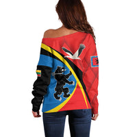 Women’s off-shoulder sweater back in red with blue, yellow, and black crest graphic