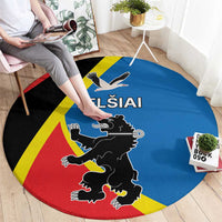 Round carpet featuring blue center, red bottom, yellow stripe and black crest