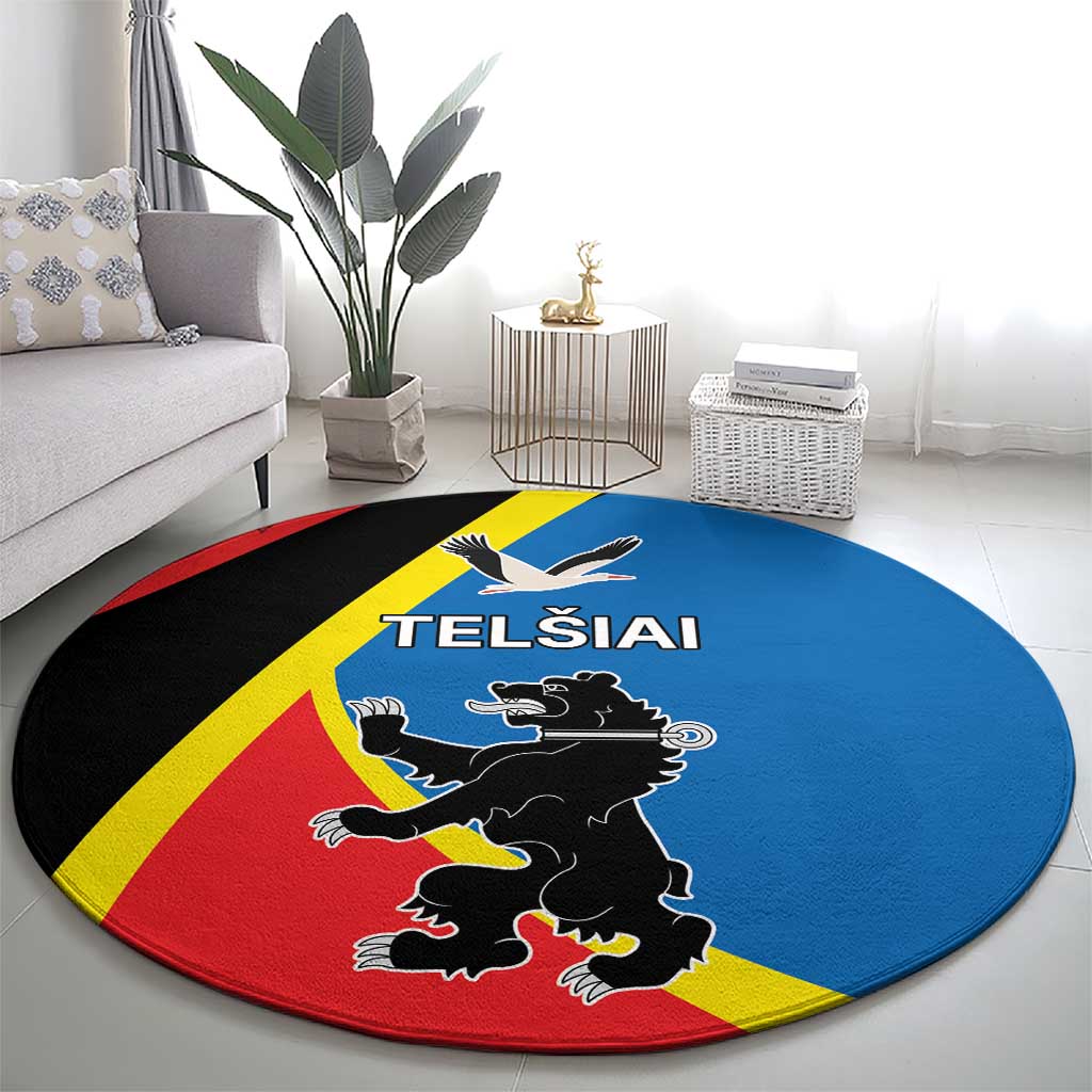 Round carpet with blue center, red edge, yellow stripe, and black animal crest