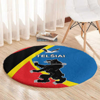 Round carpet with blue center, red edge, yellow stripe, and black crest