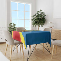 Flag-style tablecloth in red and blue with yellow diagonal stripe, table-drape view