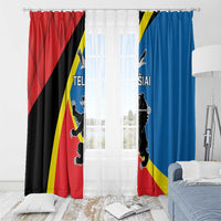 Printed window curtains with red and blue panels, crest graphics, hook-top styling