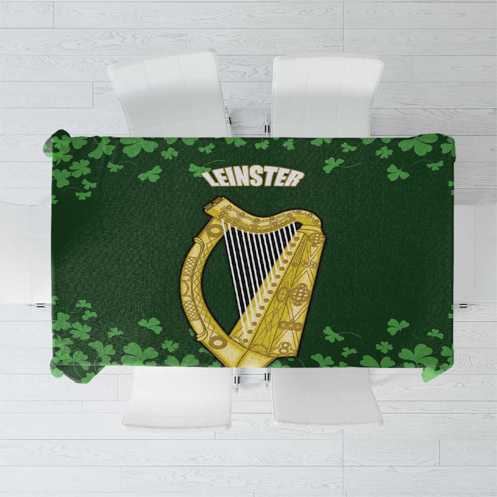 Green shamrock tablecloth with dark crest and golden harp design on front panel