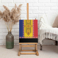 Framed canvas wall art displayed on wooden easel with colorful embroidery panel