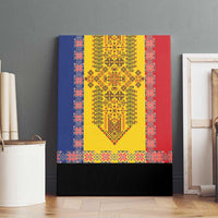 Framed canvas wall art on dark wall with yellow center embroidery and black bottom panel