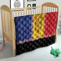 Quilt on a wooden baby crib with blue, yellow, and red panels and black diamond bottom