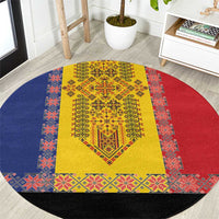 Round traditional embroidered rug with yellow center panel, red and blue border, black edge