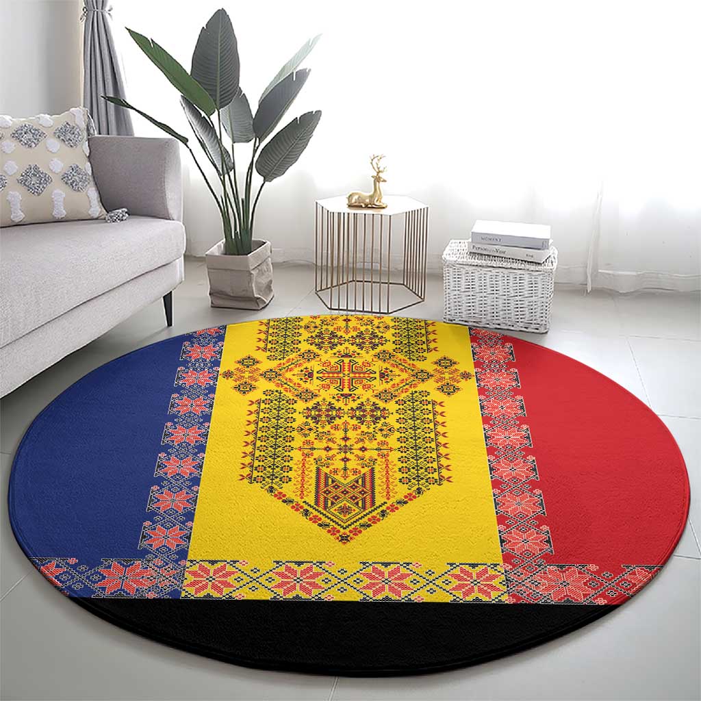 Round decorative rug featuring yellow embroidery center, red and blue geometric border