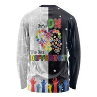 Long-sleeve autism awareness shirt with 'It's OK to be Different' puzzle heart graphic