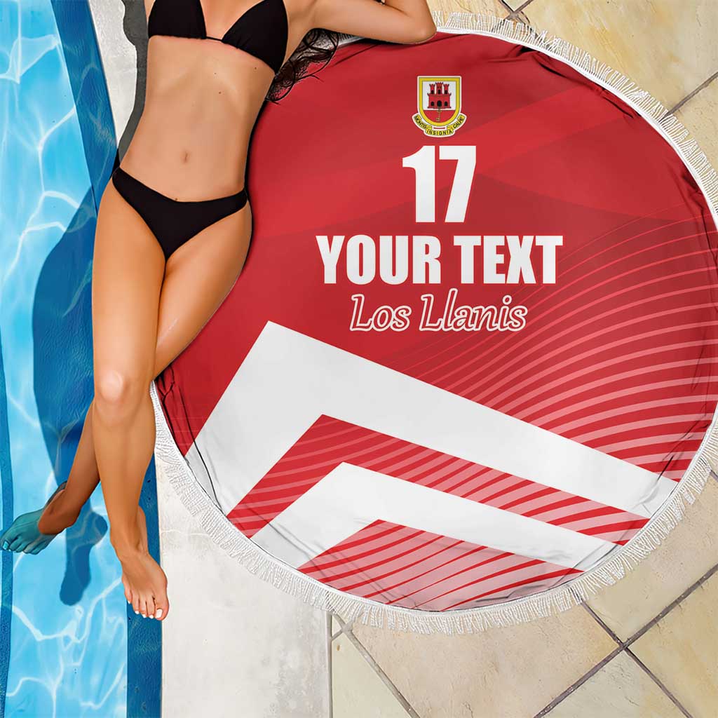 Red circular beach blanket with fringe, crest, “YOUR TEXT”, “Los Llanis” and number 17