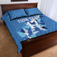 Blue quilt bed set with jersey number graphic and two matching pillowcases