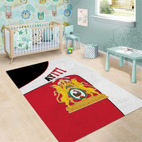 Red and white 'AYITI' crest area rug with lion coat of arms