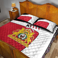 Quilt bed set with red, white, and black panels, AYITI text, and coat of arms