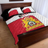 Red, white, and black quilt bed set with AYITI lettering and Haitian crest