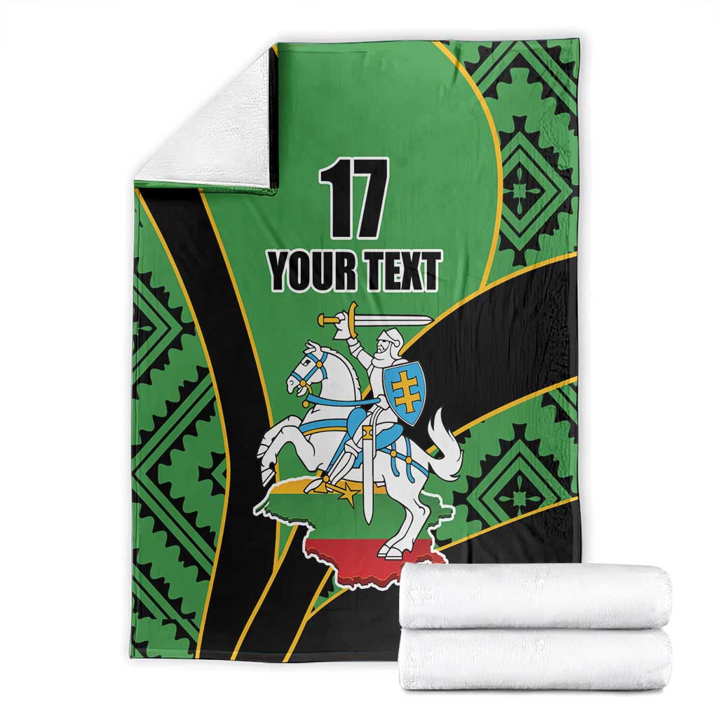 Green and black rugby-style blanket folded with '17 YOUR TEXT' rider crest and towels