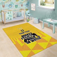 Yellow area rug with geometric pattern, hockey player graphic and 'Your Text' with '17'