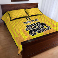 Yellow hockey quilt bed set with two pillows; bold hockey players and No.17 on quilt