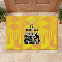 Yellow ice hockey rubber doormat with crown, number 17, and player graphic