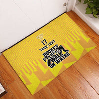 Yellow ice hockey doormat with corner-to-corner print, crown and number 17