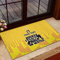 Yellow ice hockey doormat with crown, number 17, and bold on-water text