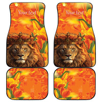 Set of 4 orange car mats with lion artwork, tulip flowers, and decorative hearts pattern