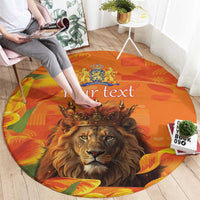 Round orange carpet with lion portrait and crest, tulip graphics and custom text