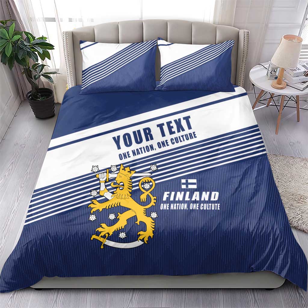 Blue and white duvet cover with Finland lion crest, striped bands, and two pillowcases