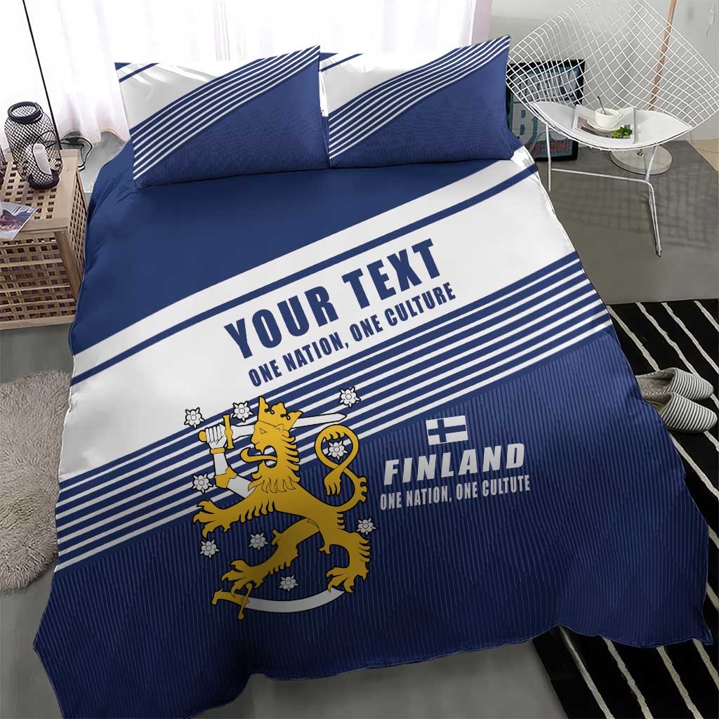 Blue and white duvet cover with Finland lion crest and striped bands, two pillowcases